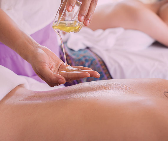Oil massage in massage bed